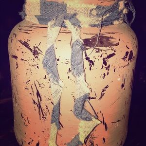 Prim distressed jar.